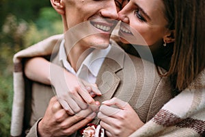 Couple in love tenderly touches by their noses. Happy newlyweds. Wedding. Artwork