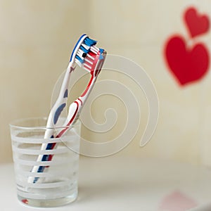 Couple in love of two toothbrushes.St. Valentines Day.