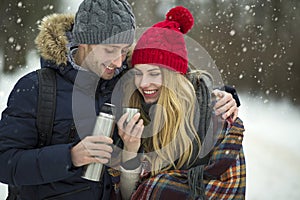 Couple in love in winter scenery