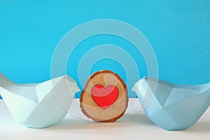 Couple of Lovebirds on wooden table