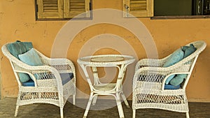 Couple lovely wickerwork chair on the room