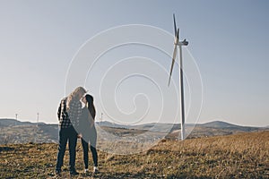 Couple of lover holding hand with sunrise. Girl and boy holding hands at sunset. Happy Romantic Young Couple Walking