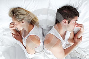 Couple lying in bed