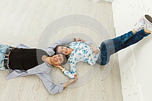 Couple lying on the floor