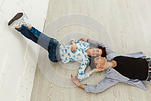 Couple lying on the floor