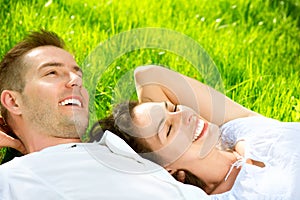 Couple Lying on Grass