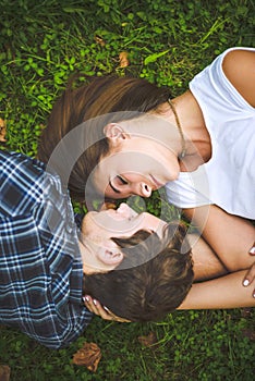 Couple lying on grass