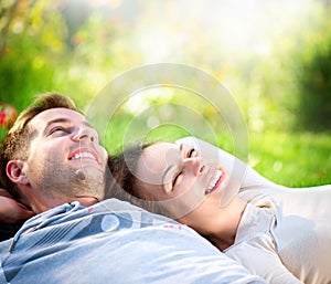 Couple Lying on Grass Outdoor