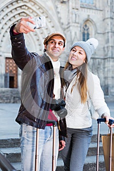 Couple making selfie outdoors