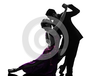 Couple man woman ballroom dancers tangoing silhouette