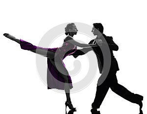 Couple man woman ballroom dancers tangoing silhouette