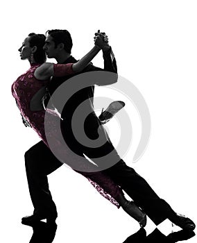 Couple man woman ballroom dancers tangoing silhouette