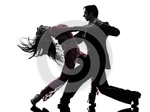 Couple man woman ballroom dancers tangoing silhouette