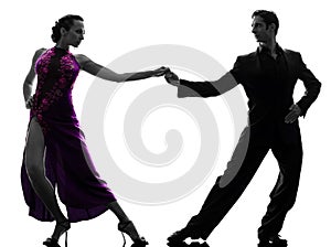 Couple man woman ballroom dancers tangoing silhouette