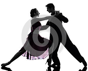 Couple man woman ballroom dancers tangoing silhouette