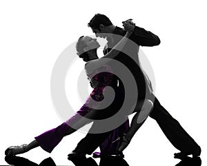 Couple man woman ballroom dancers tangoing silhouette