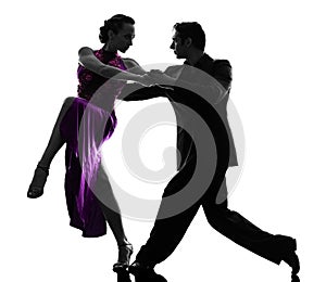 Couple man woman ballroom dancers tangoing silhouette