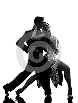 Couple man woman ballroom dancers tangoing silhouette