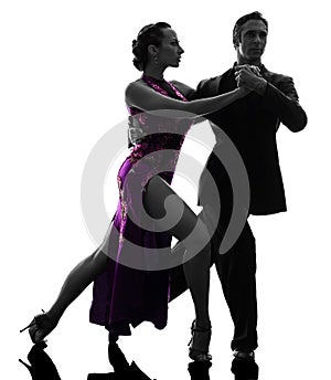 Couple man woman ballroom dancers tangoing silhouette