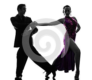 Couple man woman ballroom dancers tangoing silhouette