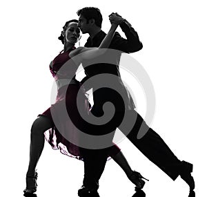 Couple man woman ballroom dancers tangoing silhouette