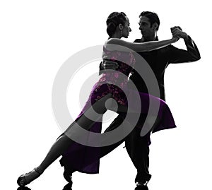 Couple man woman ballroom dancers tangoing silhouette