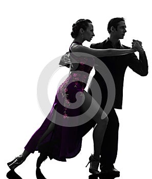 Couple man woman ballroom dancers tangoing silhouette