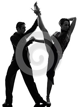 Couple man woman ballroom dancers tangoing silhouette