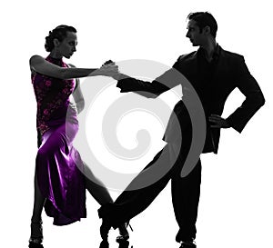 Couple man woman ballroom dancers tangoing silhouette