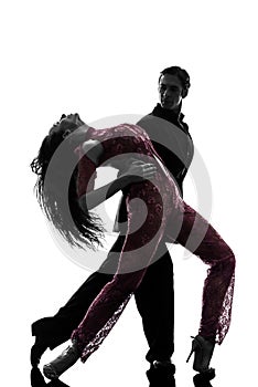 Couple man woman ballroom dancers tangoing silhouette photo