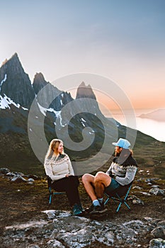 Couple man and woman on camping trip traveling together Valentines day friends hiking outdoor in mountains