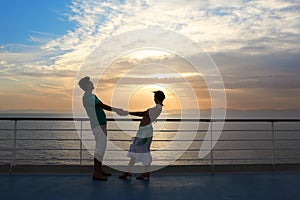 Couple: man with woman on deck of cruise ship