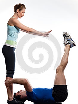 Couple,man and woman doing abdominals photo