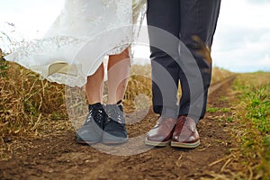 Couple man and woman feet in love romantic outdoor.