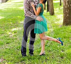 Couple Man and Woman Feet in Love Romantic Outdoor Lifestyle with nature on background Fashion trendy style