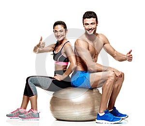 Couple man and woman fitness exercises isolated