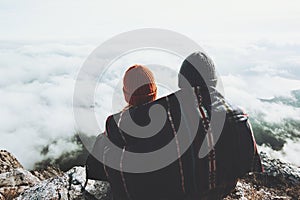 Couple Man and Woman hugging under scarf blanket