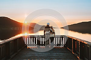 Couple man and woman hugging Valentines day family enjoying sunset lake view together travel lifestyle