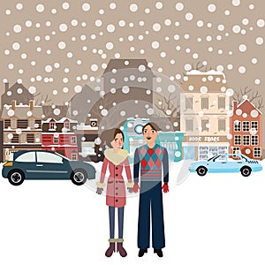 Couple man woman male female standing in snow falling winter town wearing jacket car on street city