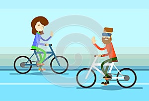 Couple Man Woman Ride Towards Bicycle Wave Hand Greeting