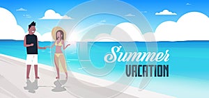 Couple man woman sunrise beach summer vacation mix race smiling walking seaside sea ocean flat horizontal banner