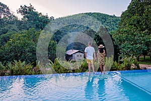 couple man and woman at a swimming pool during vacation in South Africa