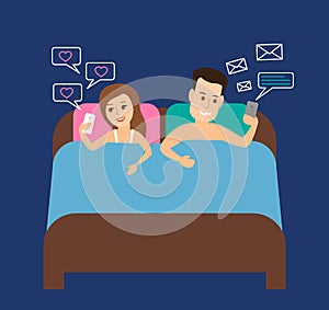 Couple man and woman using smartphone in bed at night social media internet addiction