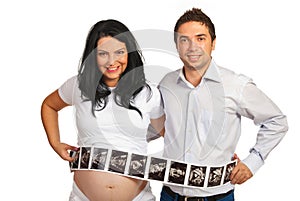 Couple with many sonogram images