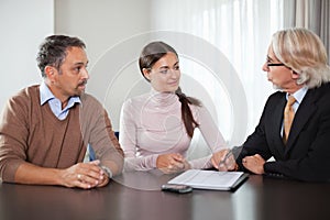 Couple in meeting with a financial planner