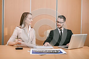 Couple meeting in office