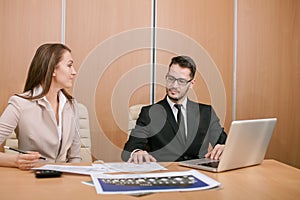 Couple meeting in office