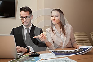 Couple meeting in office