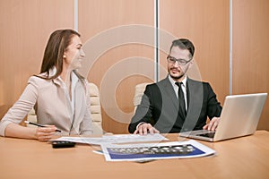 Couple meeting in office