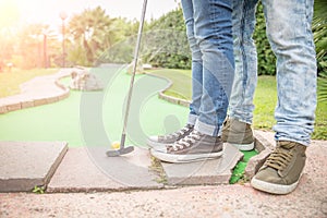 Couple at mini golf court